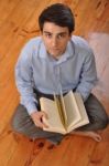 Man Reading A Book Stock Photo