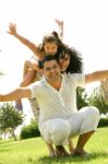 Happy Family Having Fun Outdoors Stock Photo