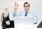 Relaxed Man showing ok sign Stock Photo