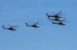 Mi-28n (havoc) Attack Helicopters Of Aerobatic Team Berkuty Fly Stock Photo