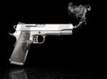 Handgun With Smoke Stock Photo