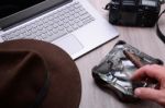 Closeup Of A Wooden Table With Laptop Stock Photo