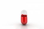 Red Pill Filled With Hearts, Medical Concept Stock Photo