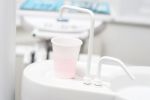 Cup Of Water In Dental Clinic Stock Photo