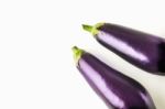 Eggplants On The White Background Stock Photo