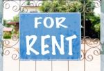 Chalkboard Sign In Front Of House For Rent Stock Photo