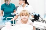 Cute Girl Child At Dental Clinic Stock Photo