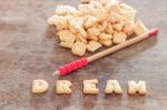 Dream Alphabet Biscuit On Wooden Table Stock Photo