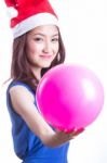 Christmas Girl Holding Pink Ball Stock Photo