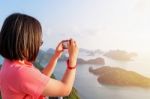 Woman On Peak Take Photos Stock Photo