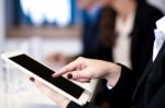 Corporate Lady Working On Tablet Device Stock Photo