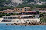 The Beach At Baja Sardinia Stock Photo