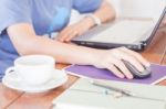 Woman Working With Laptop In Coffee Shop Stock Photo