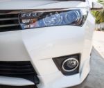 Closeup Headlights Of Modern White Car With Led Daylight Running Lights Stock Photo