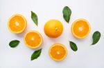 Fresh Orange Citrus Fruit On Wooden White Background. Top View Stock Photo