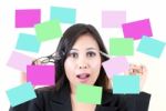 Business Lady Thinking With Note Stock Photo