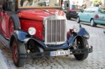 Old Fashioned Red Bus In Rothenburg Stock Photo