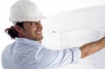 Young Good Looking Architect Showing Blueprints Stock Photo