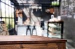 Selected Focus Empty Brown Wooden Table And Coffee Shop Or Resta Stock Photo