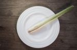 Lemongrass In Ceramic Dish On Wood Background Stock Photo