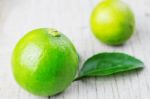 Lime On Wooden Stock Photo