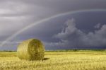 Bale Of Hay And Rainbow Stock Photo