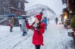 Young Woman In Shirakawa-go Village In Winter, Unesco World Heritage Sites, Japan Stock Photo