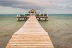 Wooden Pier Dock And Ocean View At Caye Caulker Belize Caribbean Stock Photo