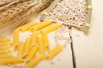 Italian Pasta Penne With Wheat Stock Photo