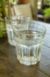 Glass Of Melt Iced Water Stock Photo