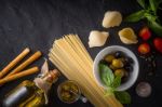 Set Of Italian Food On The Black Stone Table Top View Stock Photo