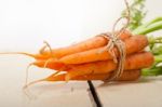 Baby Carrots Bunch Tied With Rope Stock Photo