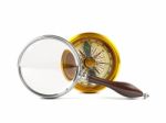 Magnifying Glass Investigate Golden Compass Stock Photo