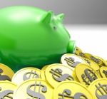 Piggybank Surrounded In Coins Shows American Finances Stock Photo