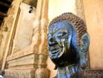 Bronze Buddha Statue At The Haw Phra Kaew, Vientiane, Laos Stock Photo