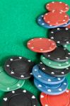 Poker Chips On Green Baize Casino Stock Photo