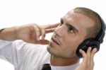 Businessman Holding Headphone Stock Photo