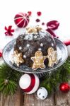 Christmas Pudding With Gingerbreads Stock Photo