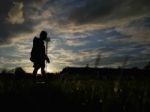 Silhouette  Running On Road At Sunrise Stock Photo