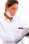 Front View Of Doctor Writing Prescription Stock Photo