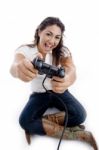 Sitting Woman Showing Remote Stock Photo