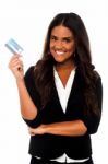 Attractive Corporate Lady Displaying Credit Card Stock Photo