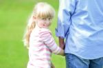 Father And Daughter Taking A Walk Stock Photo