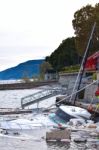 Destroyed  By Thunderstorm Piers With Boats In Verbania, Italy Stock Photo