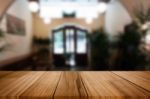 Selected Focus Empty Brown Wooden Table And Coffee Shop Or Resta Stock Photo