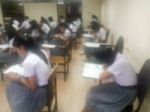 Blur Background University Students Writing Answer Doing Exam In Stock Photo