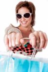 Happy Young Woman With Shopping Bags On White Stock Photo