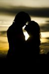 Couple At Sunset Stock Photo