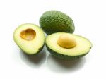 Avocados On White Background Stock Photo