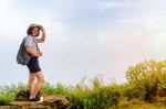 Tourist Teen Girl Poses On Mountain Stock Photo